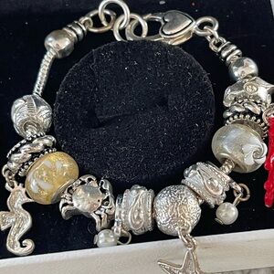 Elegant Silver and Gold Charm Bracelet